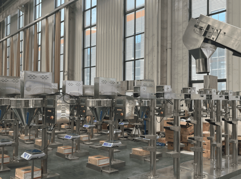 Stainless steel powder filling machines in food manufacturing plant