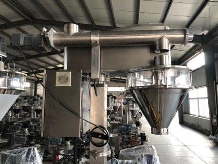 Stainless steel screw metering machine in manufacturing workshop for maintenance and cleaning guide