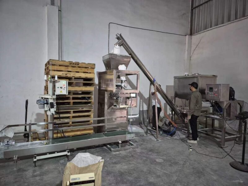 Retrofitted automatic protein powder auger filling line in food manufacturing plant